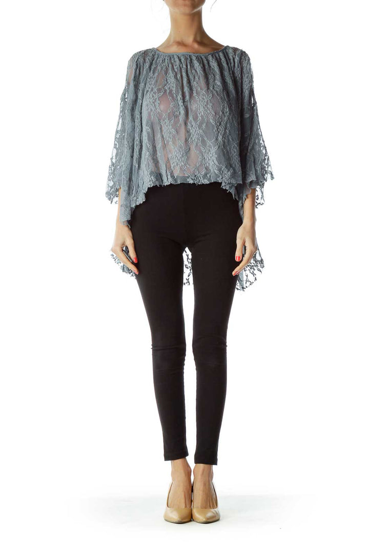 Front view of gray lace sheer poncho top with bell sleeves