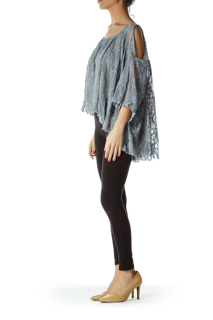 Front view of gray lace sheer poncho top with bell sleeves