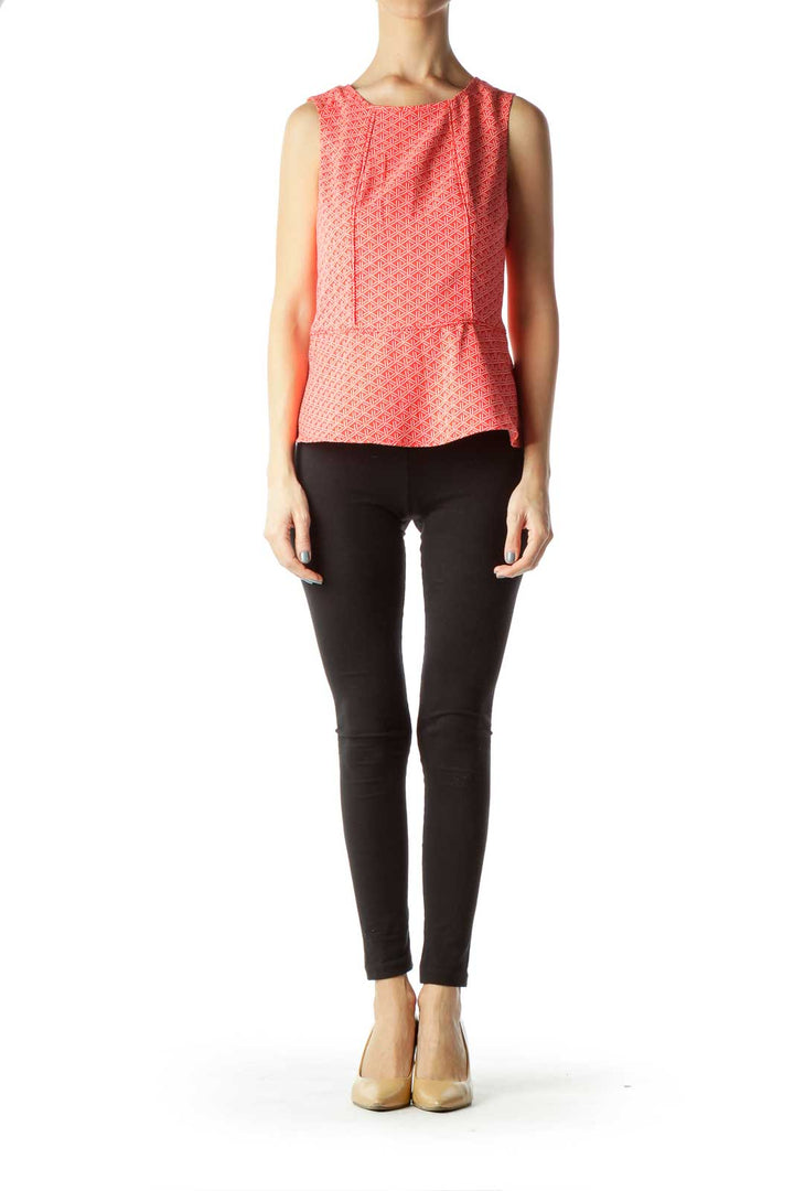 Front view of Banana Republic coral geometric print sleeveless peplum top