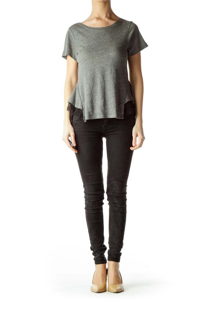 Front view of gray Free People peplum t-shirt with black lace trim