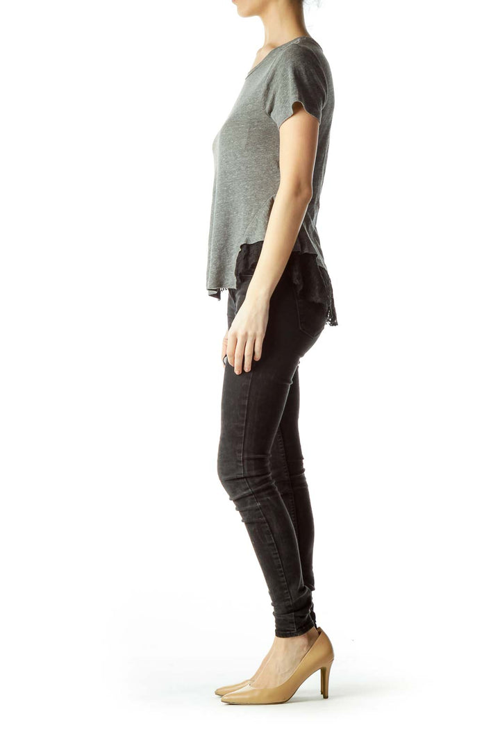 Front view of gray Free People peplum t-shirt with black lace trim