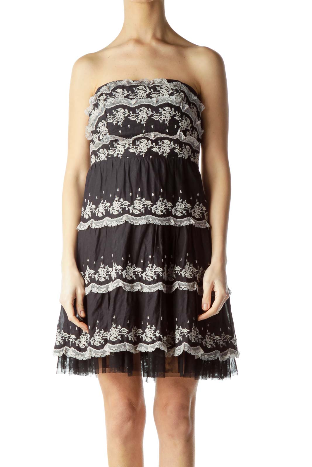 Front view of black strapless lace tiered dress by Free People