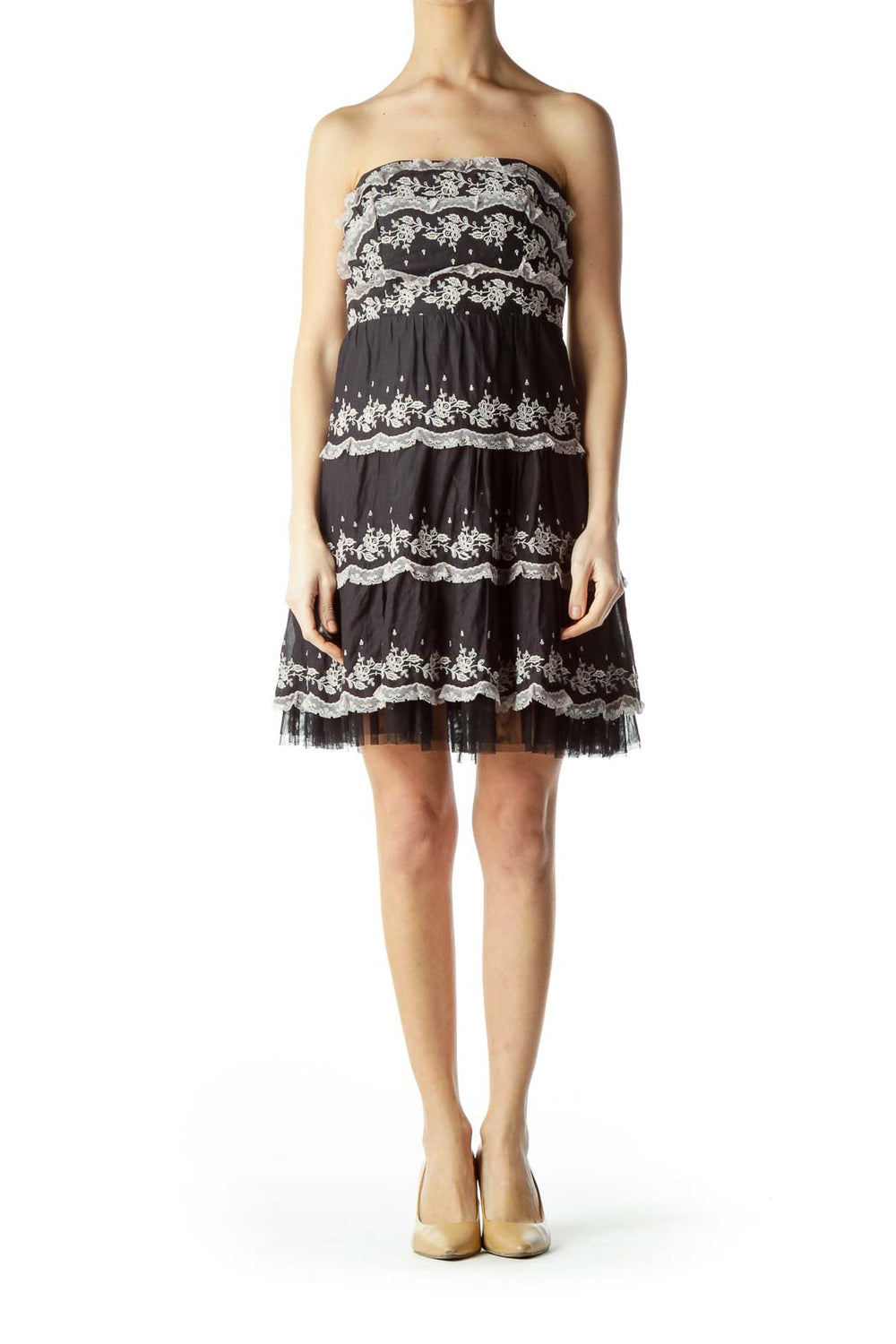 Front view of black strapless lace tiered dress by Free People