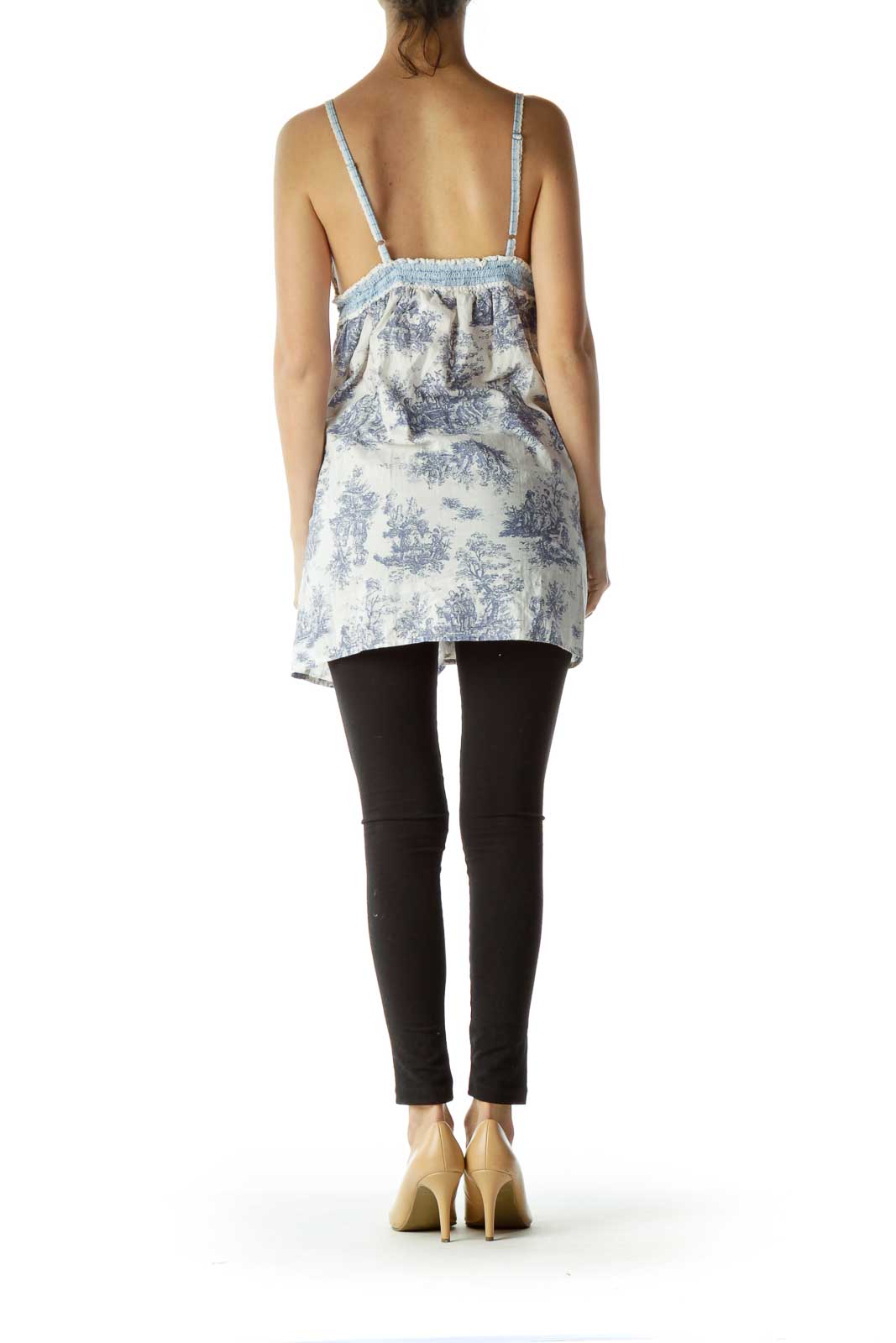 Back view of Free People blue and white floral babydoll camisole top showing spaghetti straps