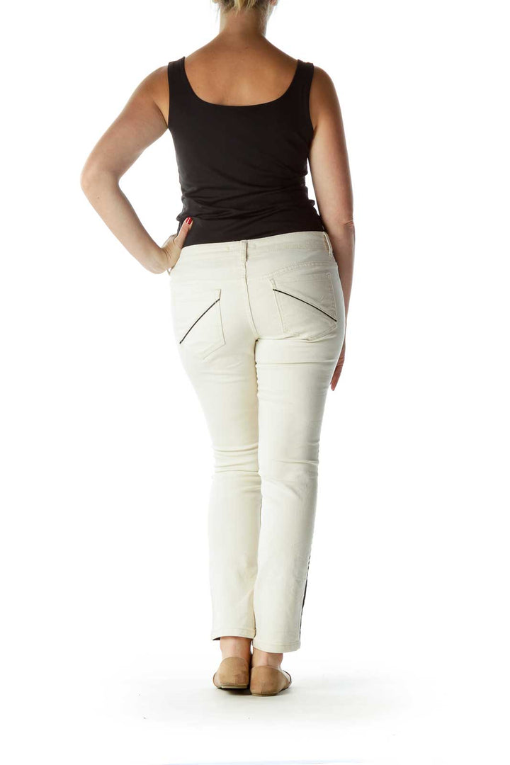 Back view of Free People white skinny pants showing pocket design