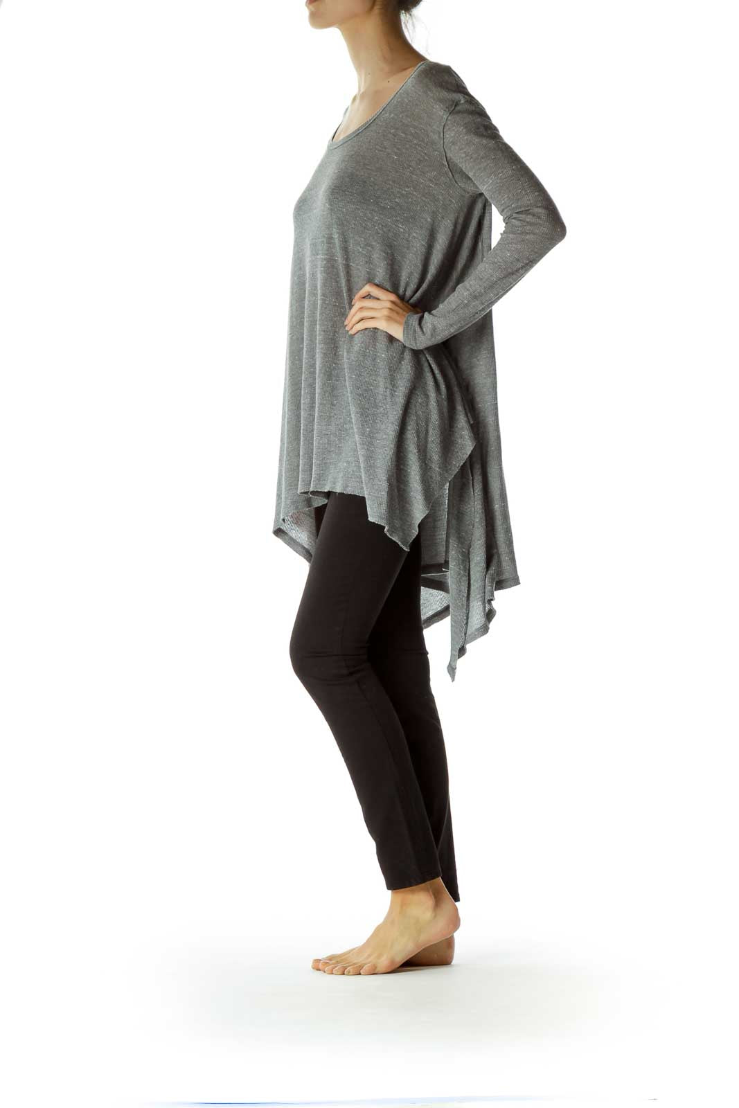 Front view of Free People gray asymmetrical flowy tunic top on model