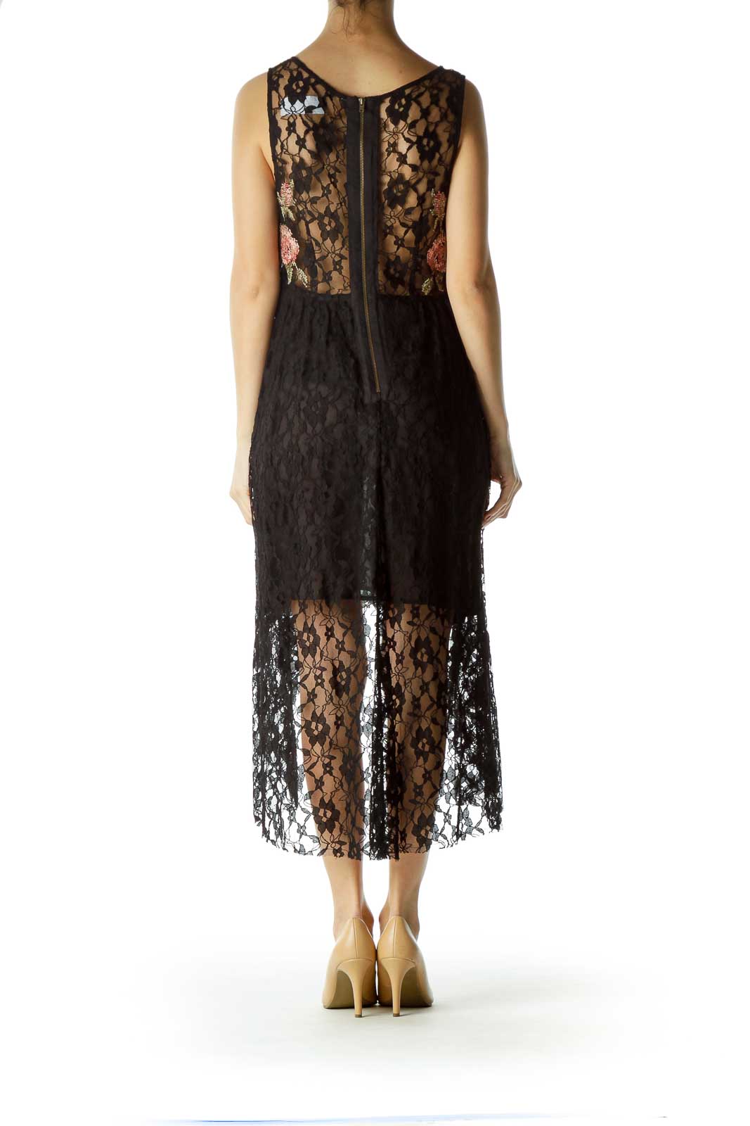 Back view of Free People black lace dress showing exposed zipper and high-low hem