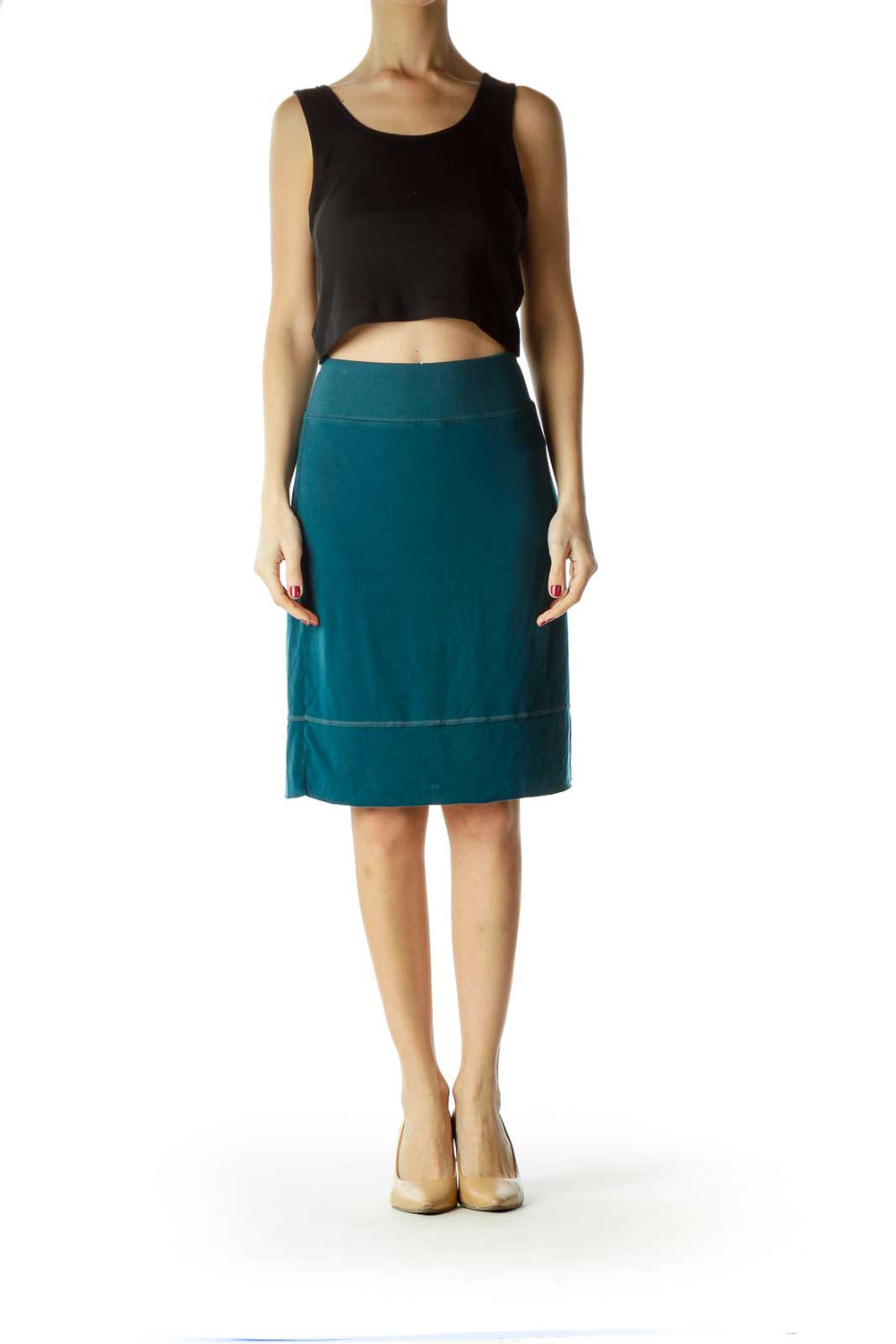 Front view of teal Free People A-line skirt on model