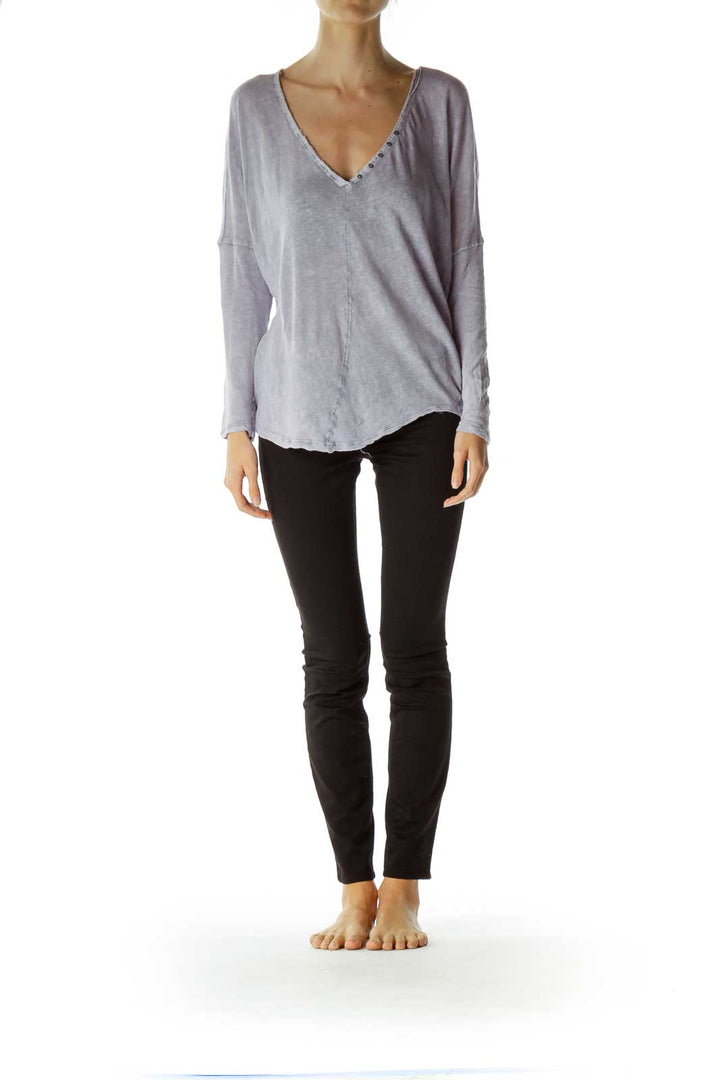 Front view of lavender Free People V-neck oversized long sleeve top