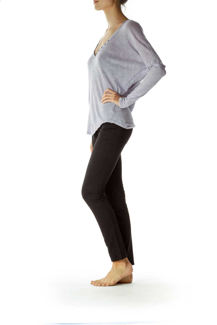 Front view of lavender Free People V-neck oversized long sleeve top