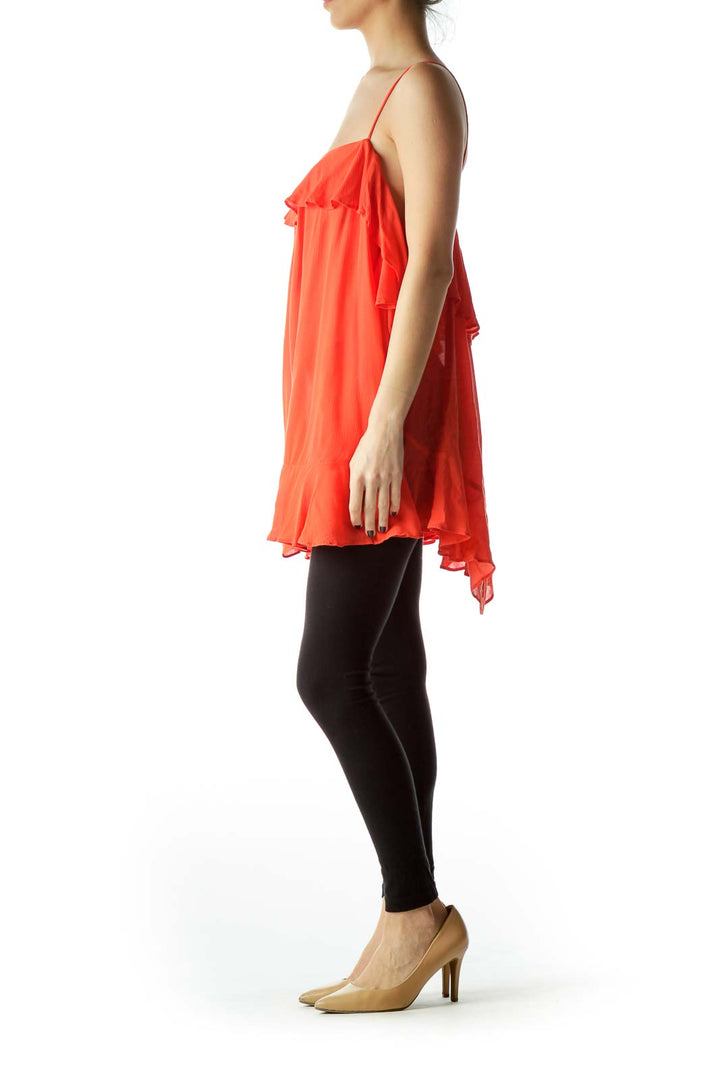 Front view of Free People coral ruffled spaghetti strap top on mannequin