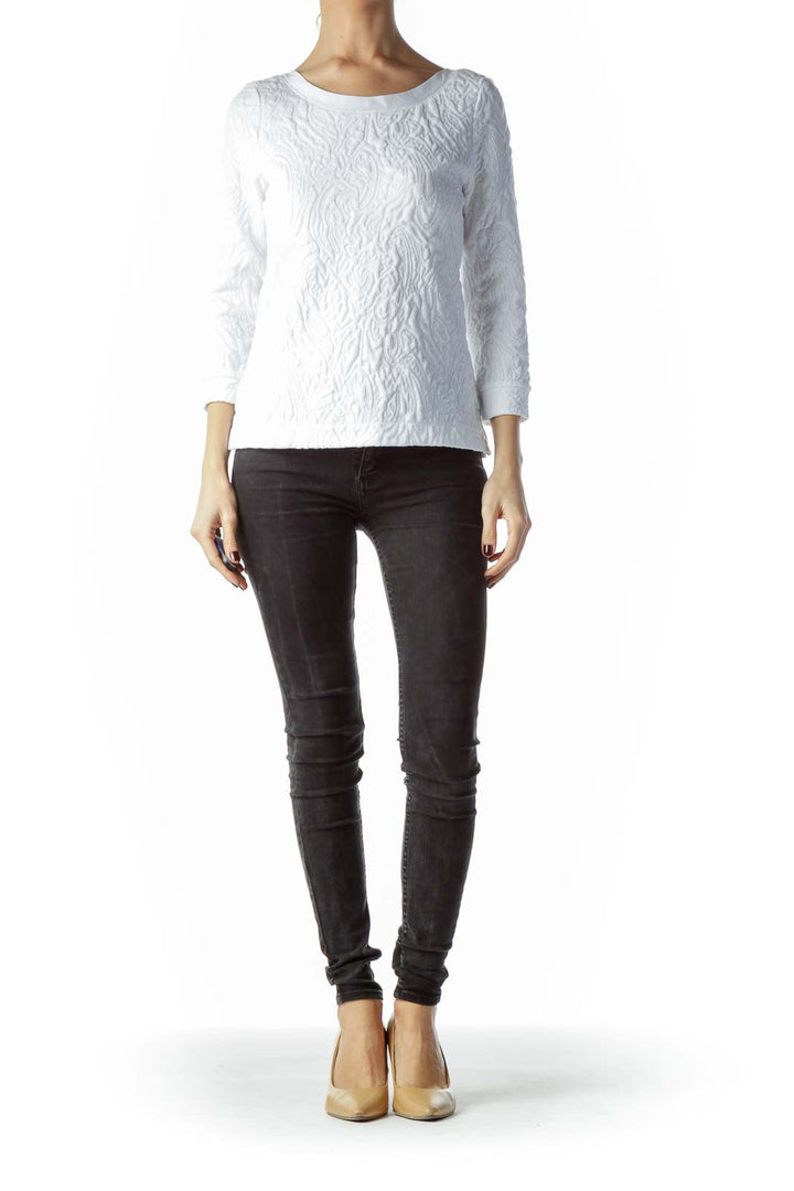 Front view of white textured Free People long sleeve top on model