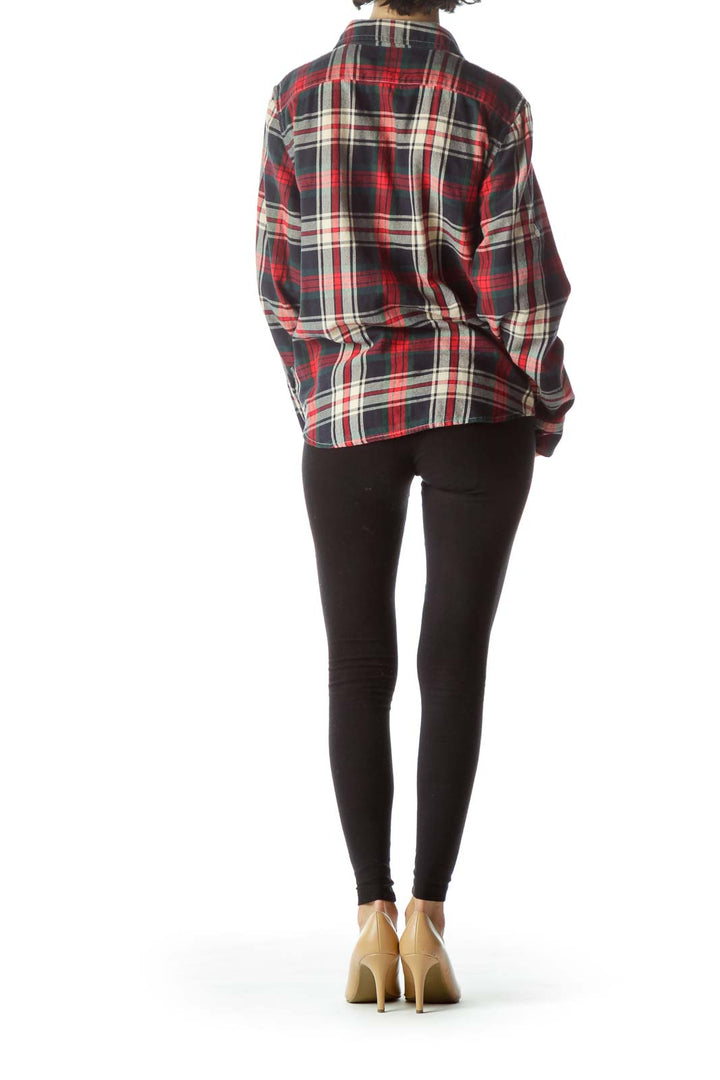 Back view of red plaid flannel shirt showing full pattern