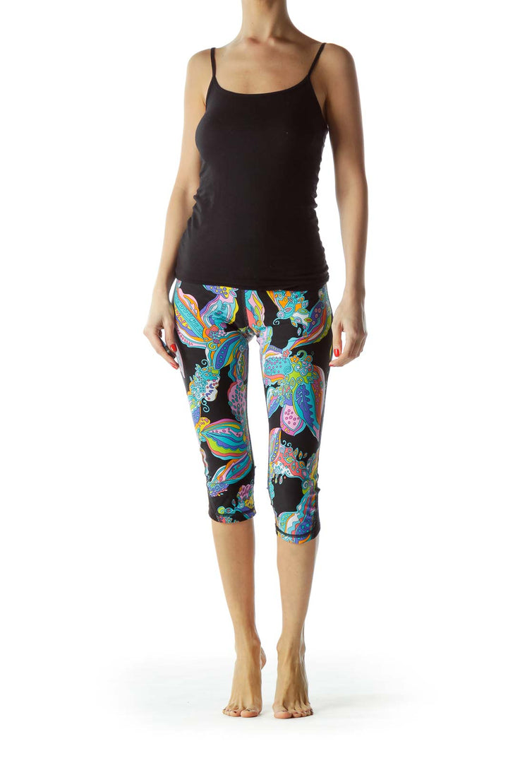 Front view of Trina Turk multicolor floral print capri leggings on model