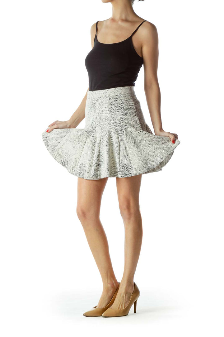 Front view of white textured flare mini skirt from Banana Republic