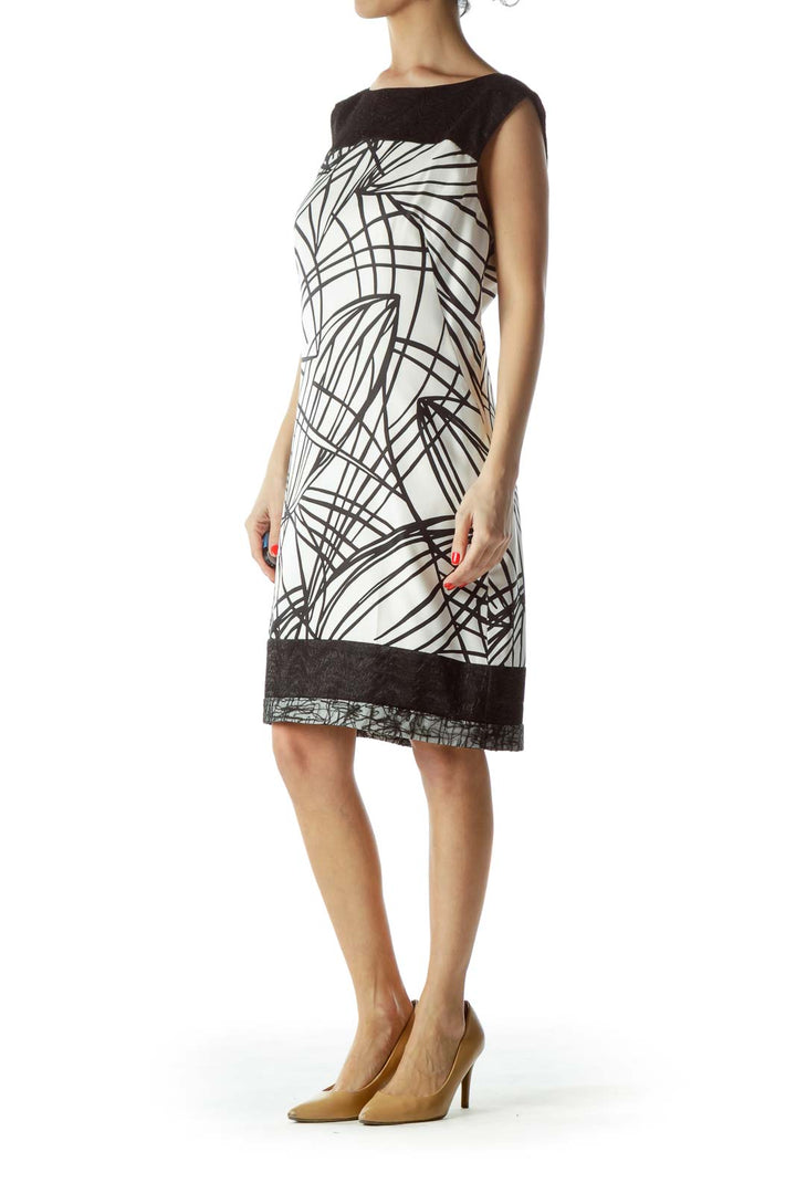 Front view of Ann Taylor black and white geometric print shift dress