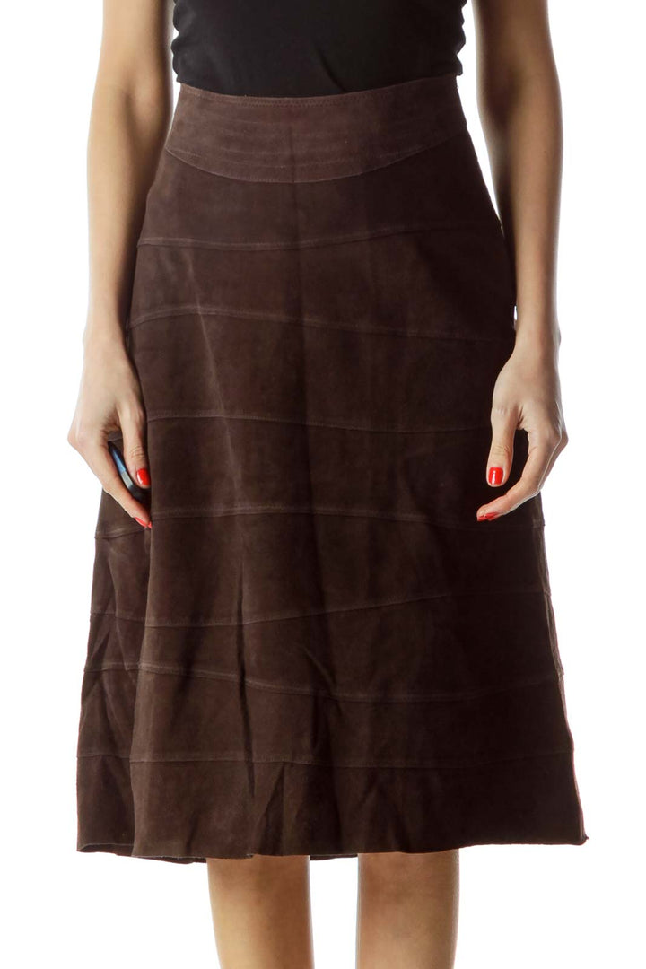 Front view of D.E.S. Studio brown suede A-line midi skirt