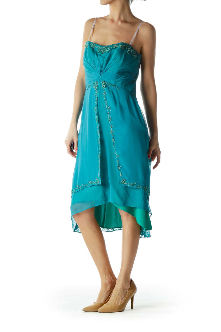 Front view of teal LAUNDRY by SHELLI SEGAL cocktail dress with beaded embellishments and high-low hemline