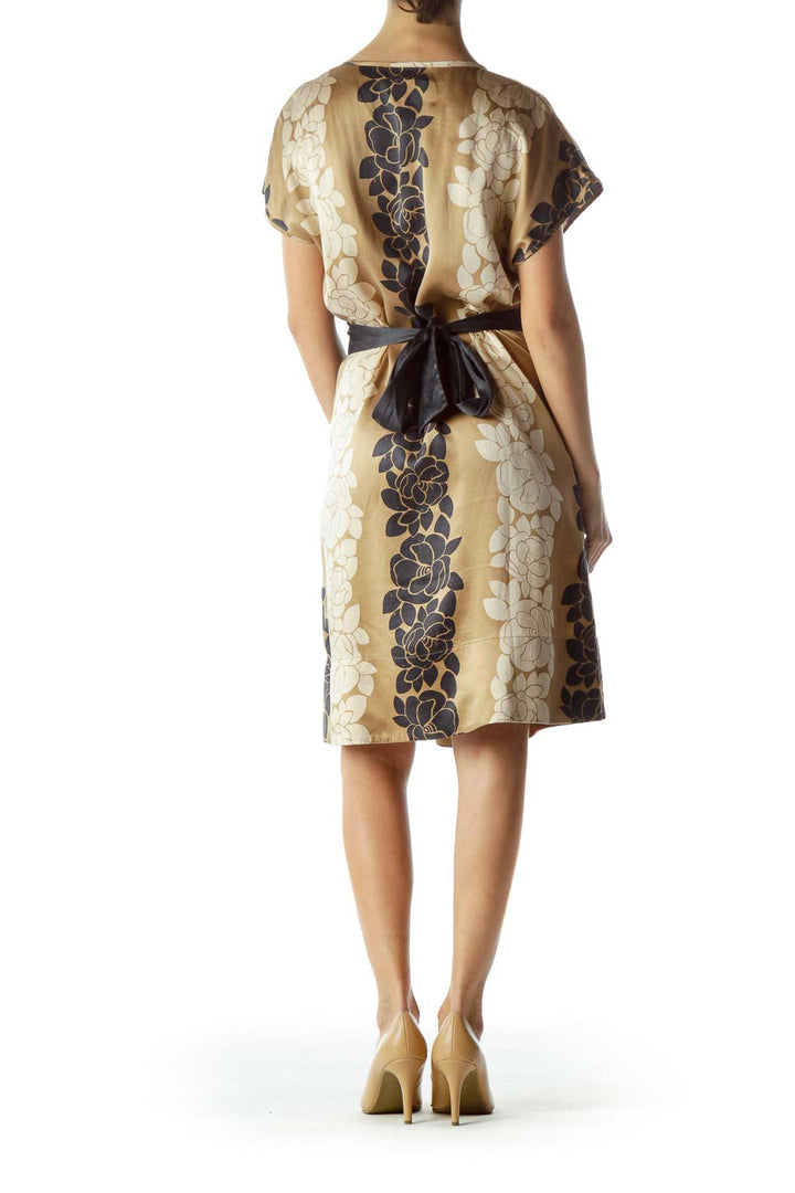 Back view of SilkRoll beige floral print empire waist dress with tie detail