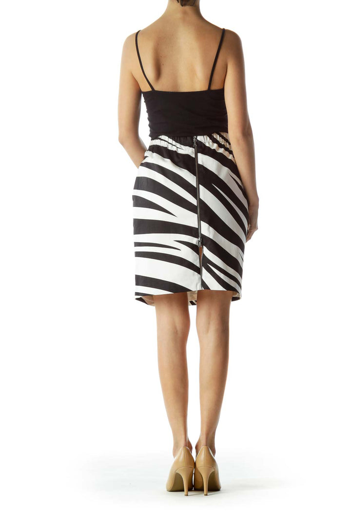 Back view of Club Monaco black and white zebra print pencil skirt with zipper closure