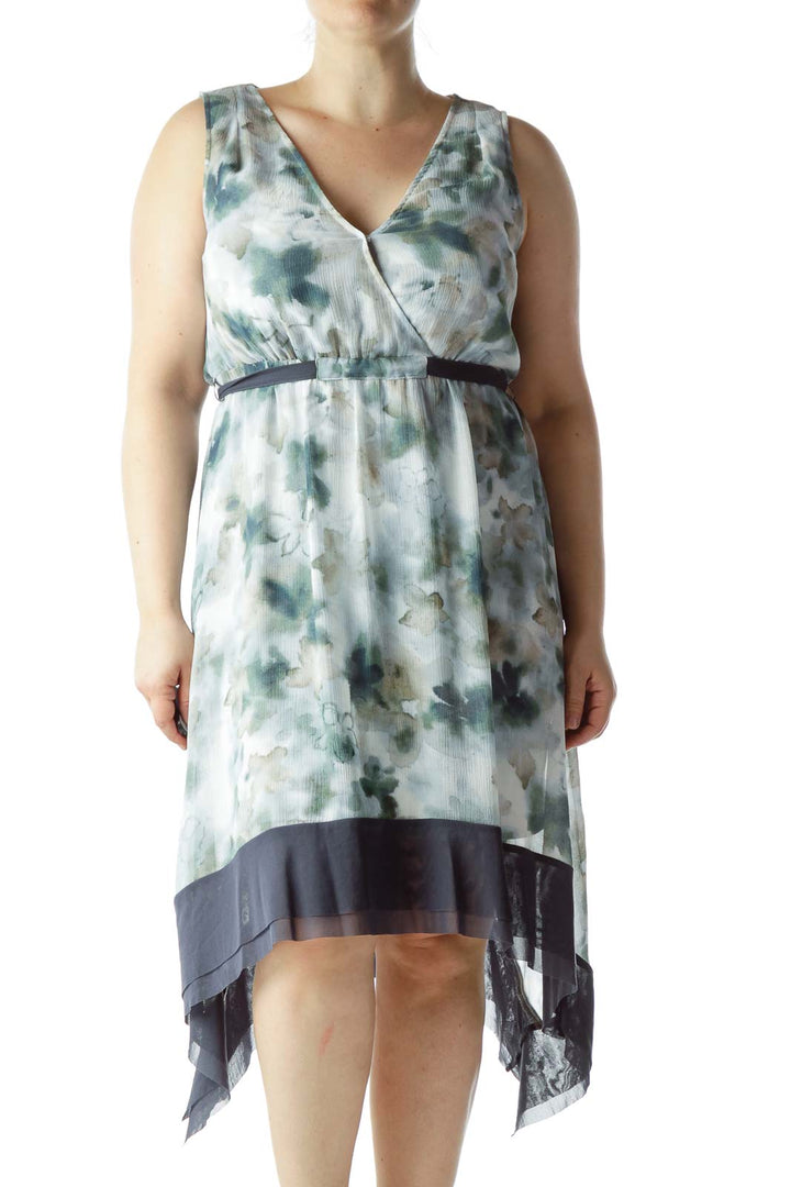 Front view of Simply Vera Vera Wang green floral watercolor high-low dress with wrap bodice and navy belt