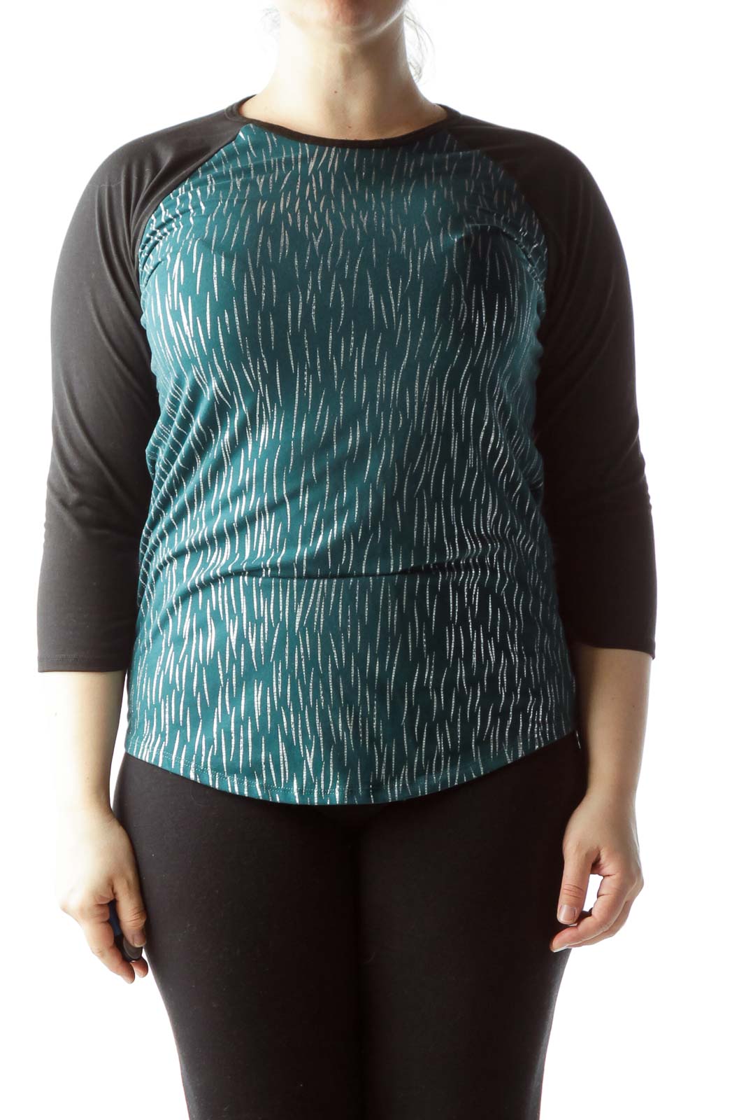 Front view of Lula Roe teal patterned raglan sleeve top with black sleeves