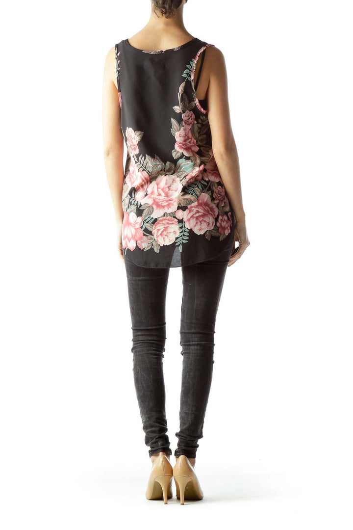 Back view of Vivace Black Floral Print Sleeveless Tank Top showing longer hem