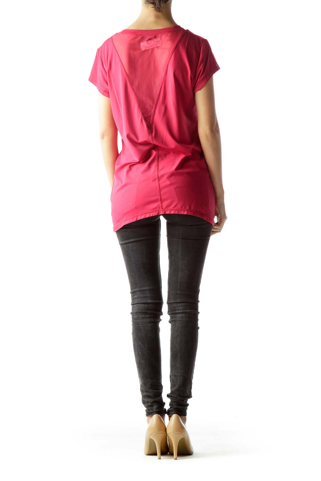 Back view of pink Alala athletic top showcasing twist-back design