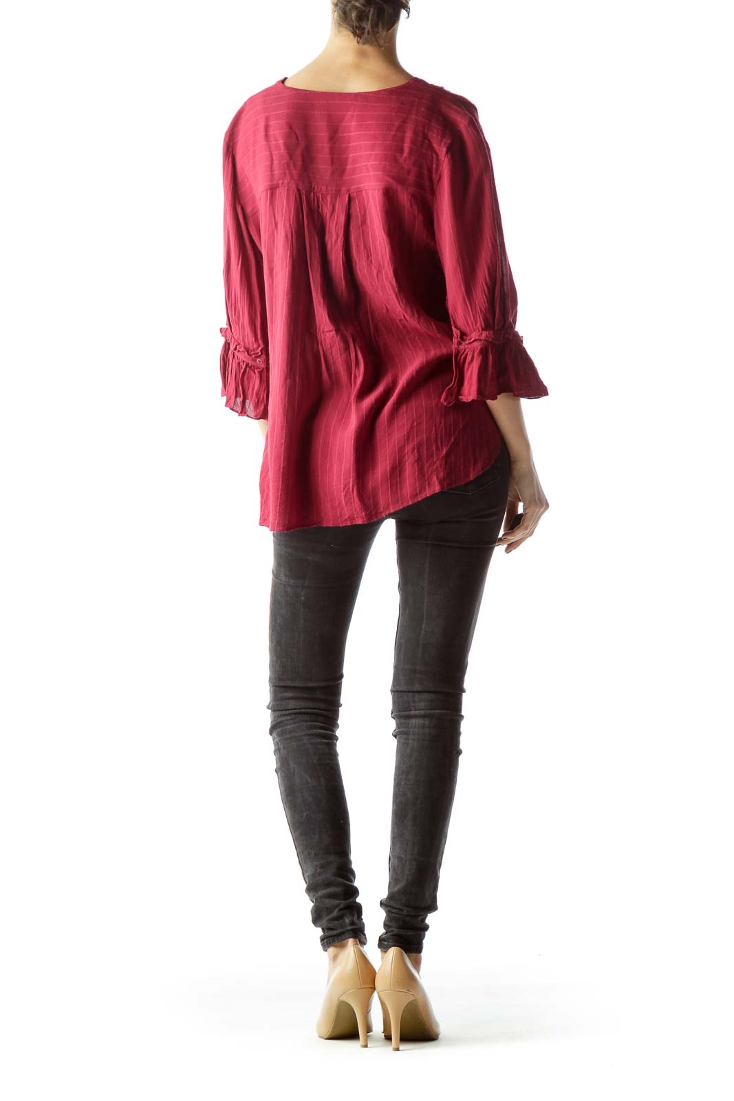 Back view of red striped blouse showing relaxed fit and bell sleeves