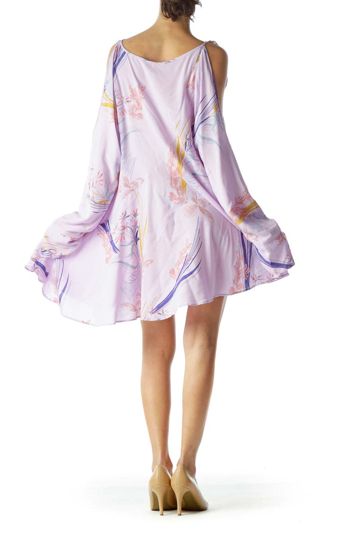 Back view of lavender floral cold shoulder swing dress from Free People