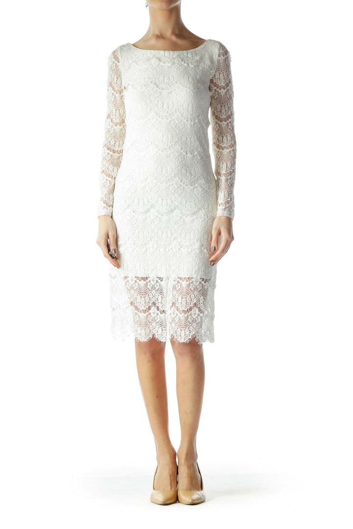 Front view of white lace long sleeve midi dress by BLAQUE LABEL