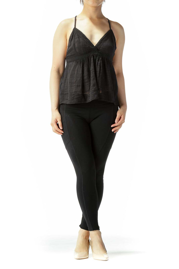 Front view of black flowy camisole top with lace trim by Melrose and Market