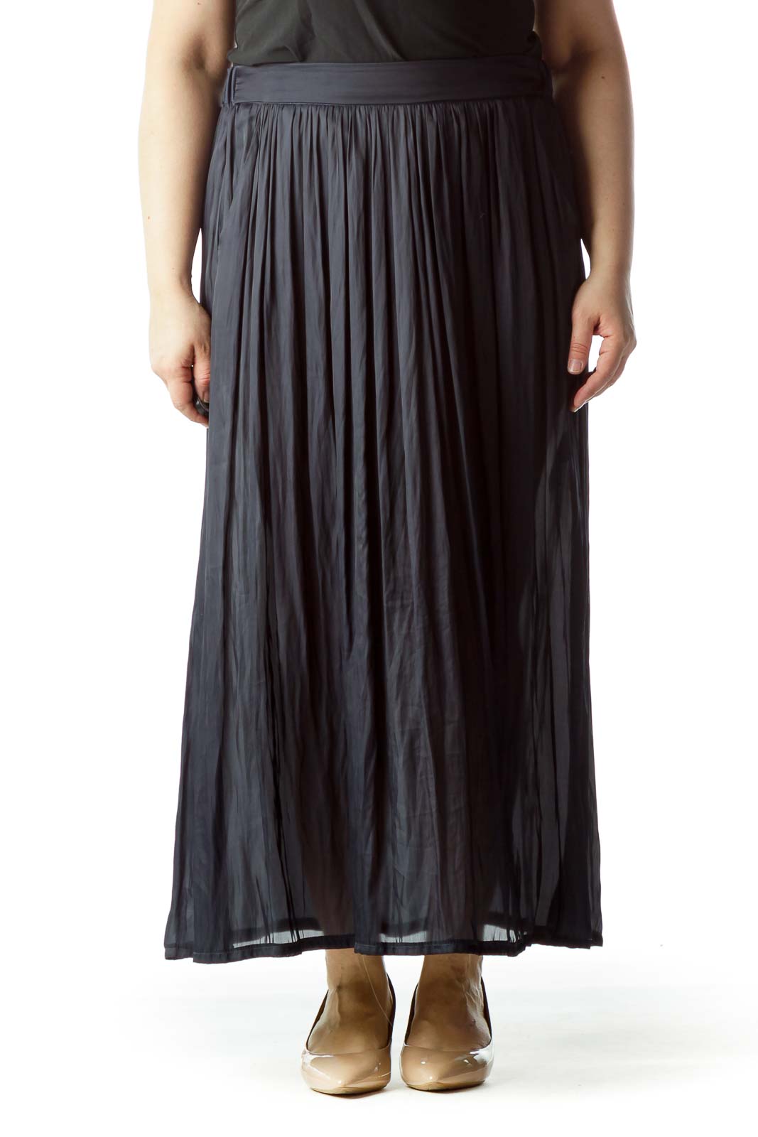 Front view of Lauren Vidal black pleated maxi skirt on model