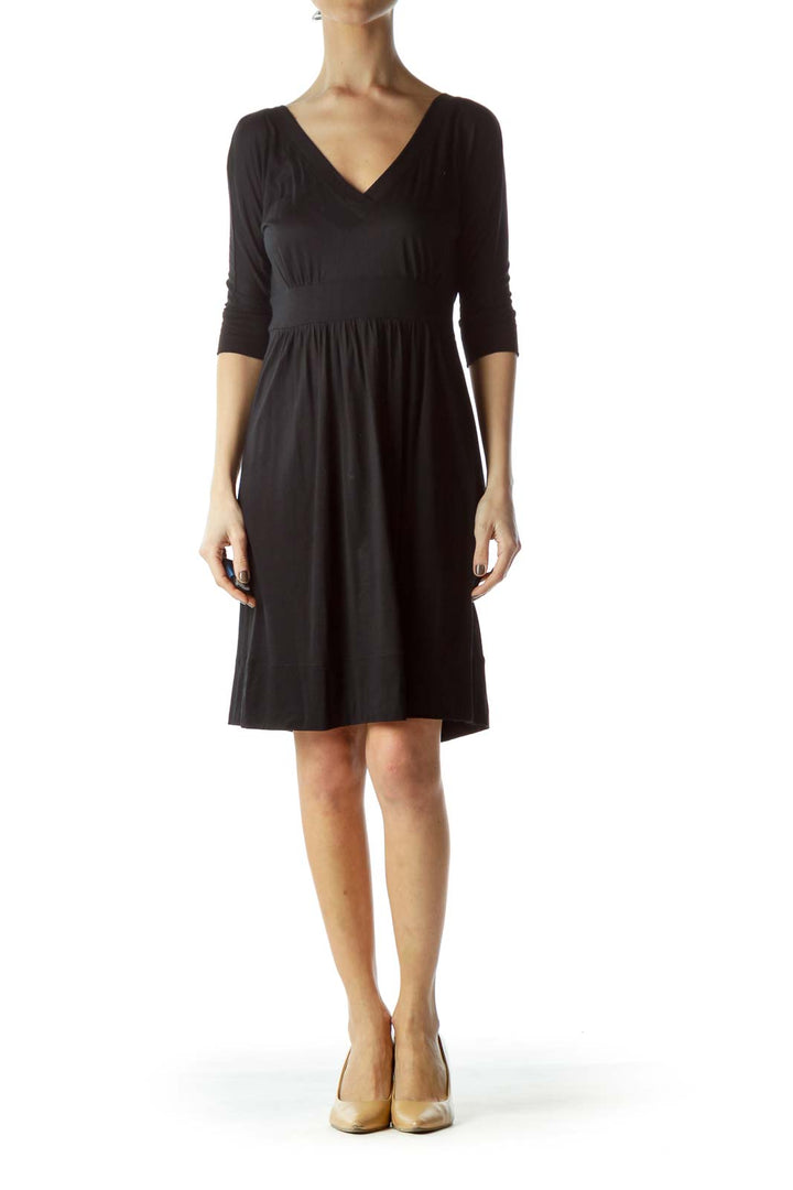 Front view of black Juicy Couture V-neck empire waist dress