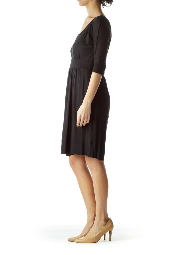 Front view of black Juicy Couture V-neck empire waist dress