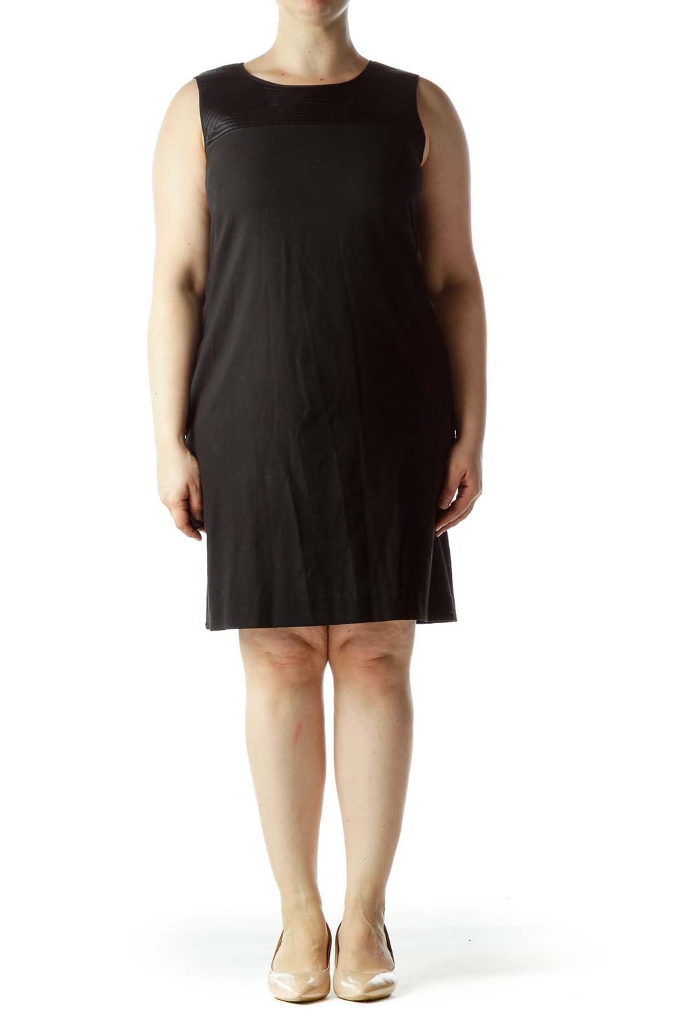 Front view of DKNY black sleeveless sheath dress on model