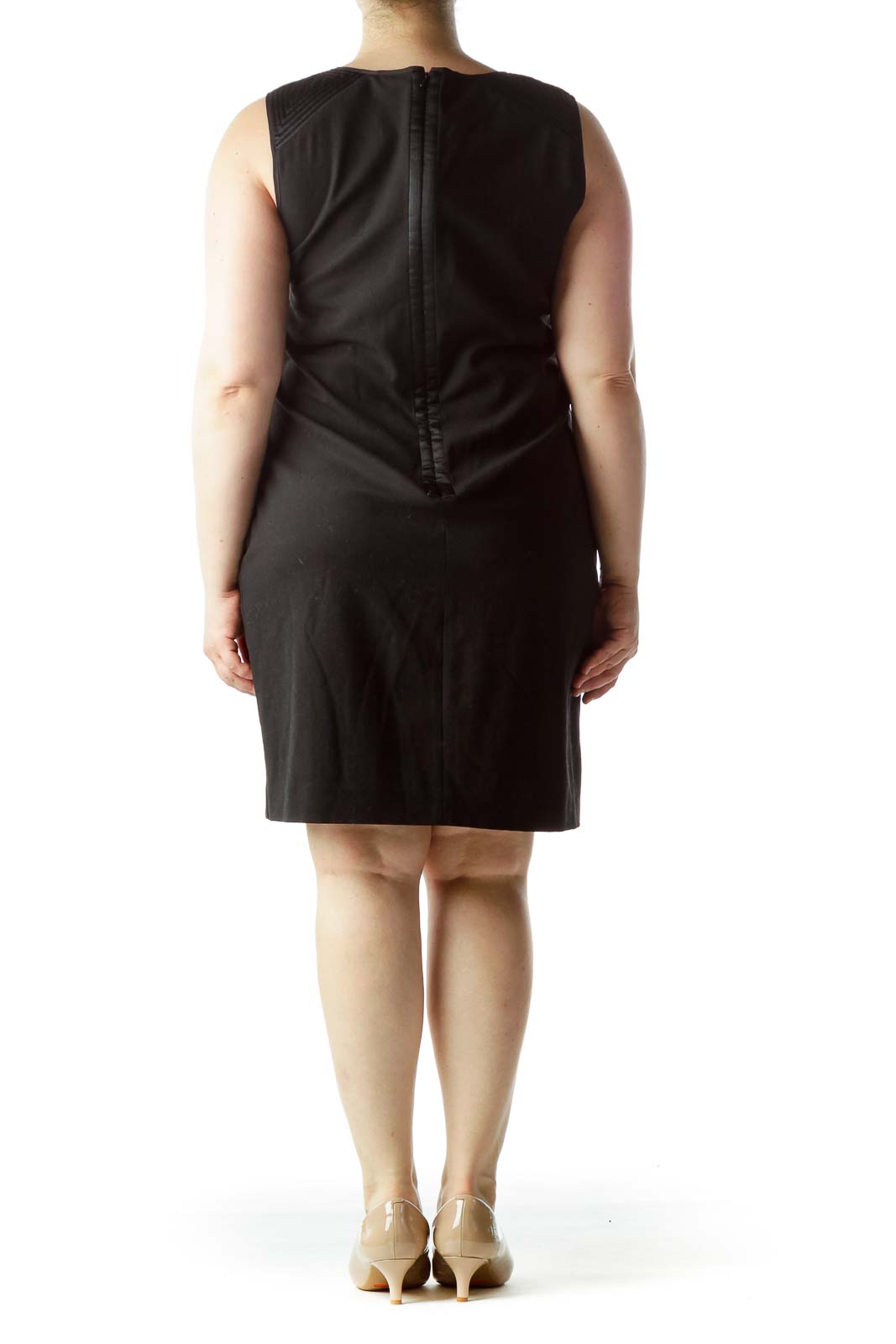 Back view of DKNY black sleeveless sheath dress showing zipper closure