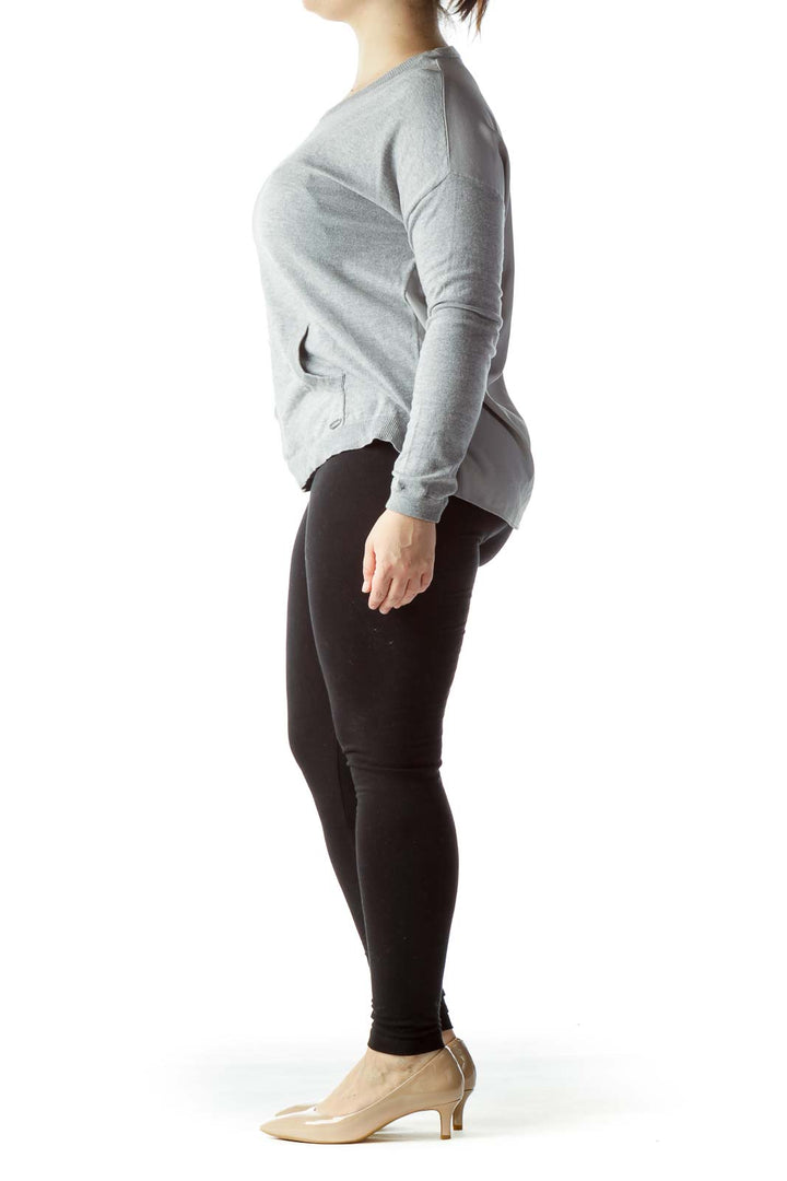 Front view of Calvin Klein gray long-sleeve crewneck sweater with front pockets