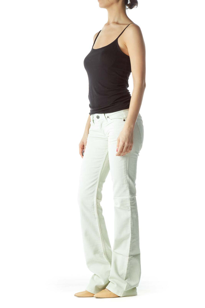 Front view of Grass LA white flared jeans on model