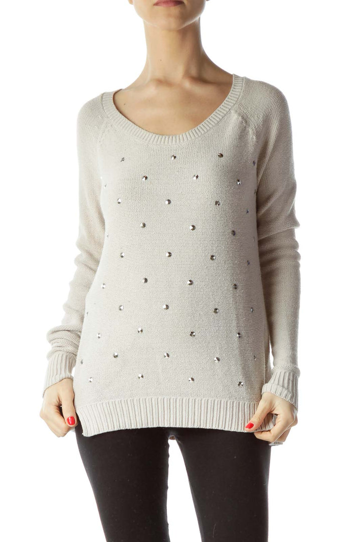 Front view of cream Rock & Republic knit sweater with rhinestone embellishments