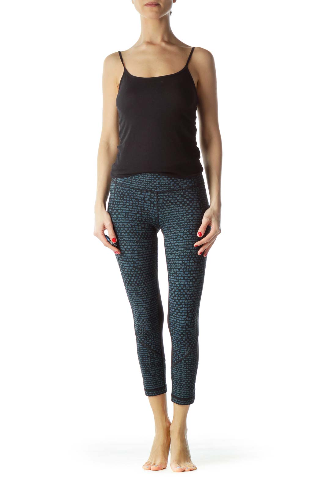 Front view of Lululemon blue patterned cropped leggings with black top