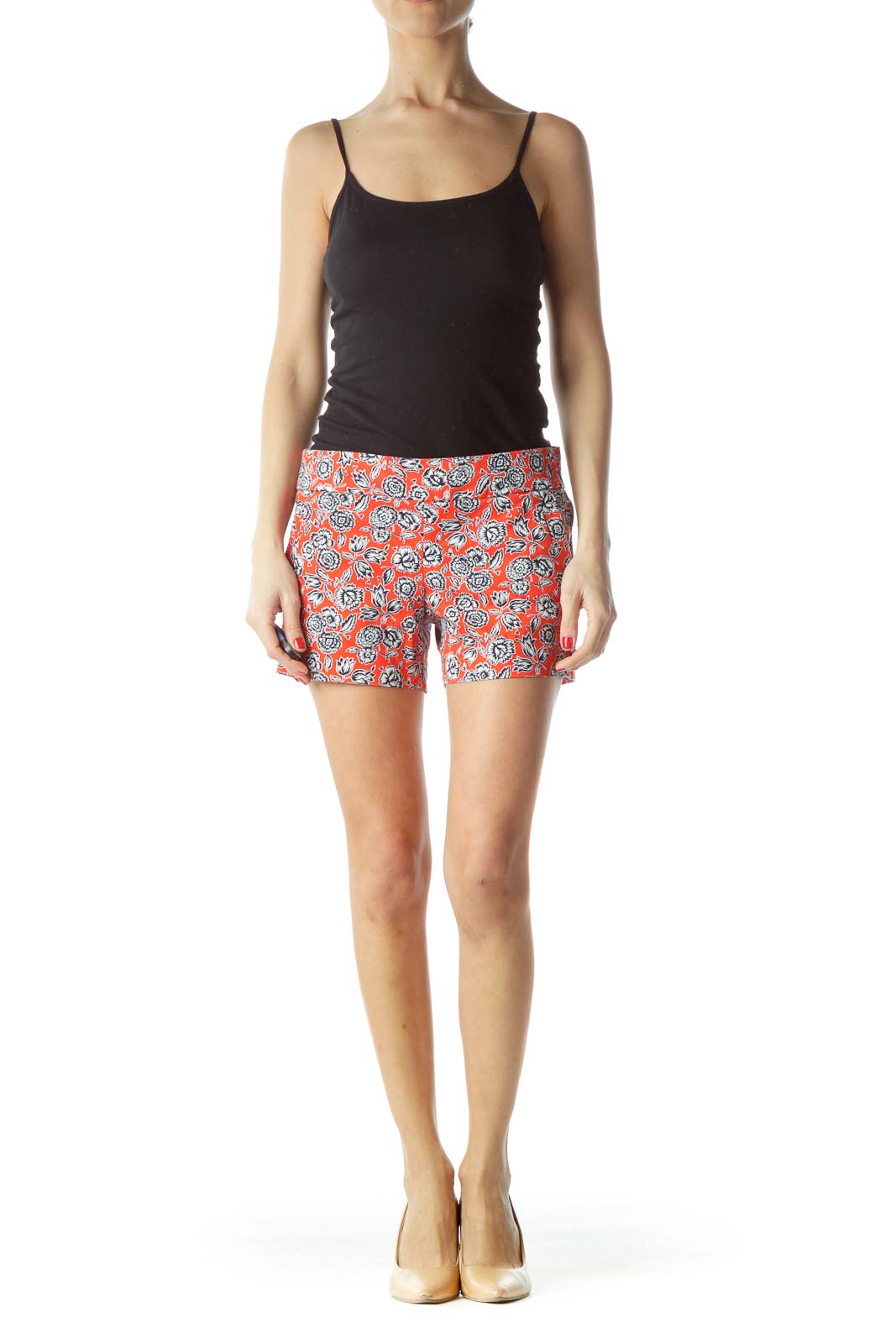 Front view of J.Crew red floral print chino shorts on model