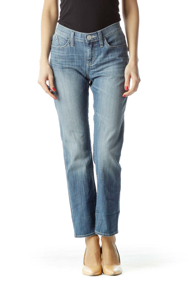 Front view of Rock & Republic light blue straight leg jeans on model