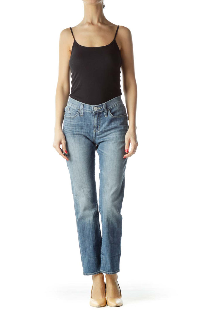 Front view of Rock & Republic light blue straight leg jeans on model