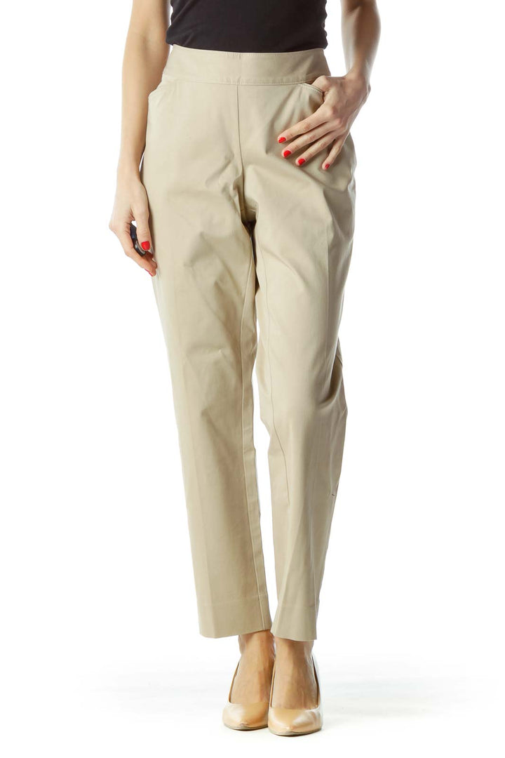 Front view of White House Black Market beige straight-leg pants