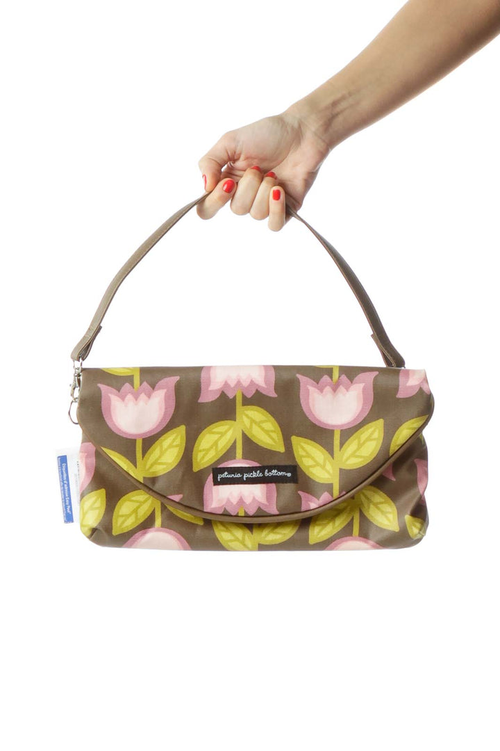 Front view of Brown Floral Print Clutch Bag by Petunia Pickle Bottom