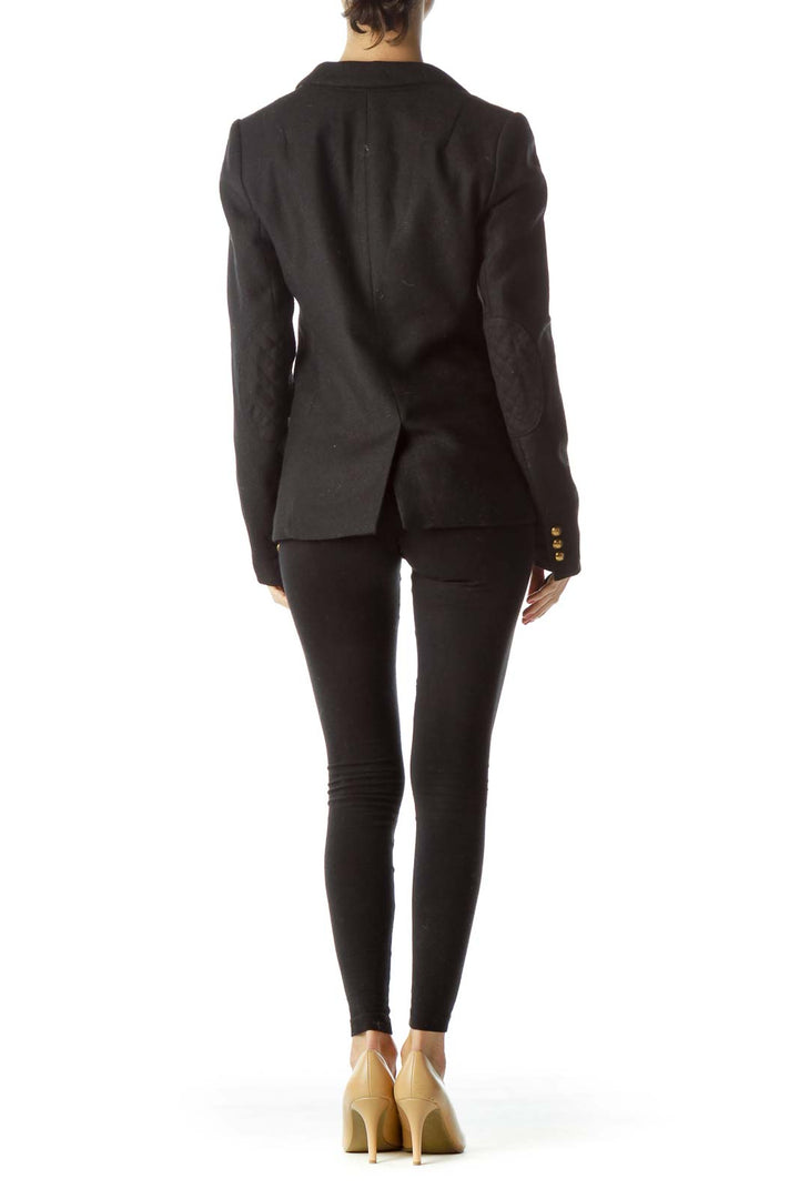 Back view of black Banana Republic blazer showing tailored fit and vent