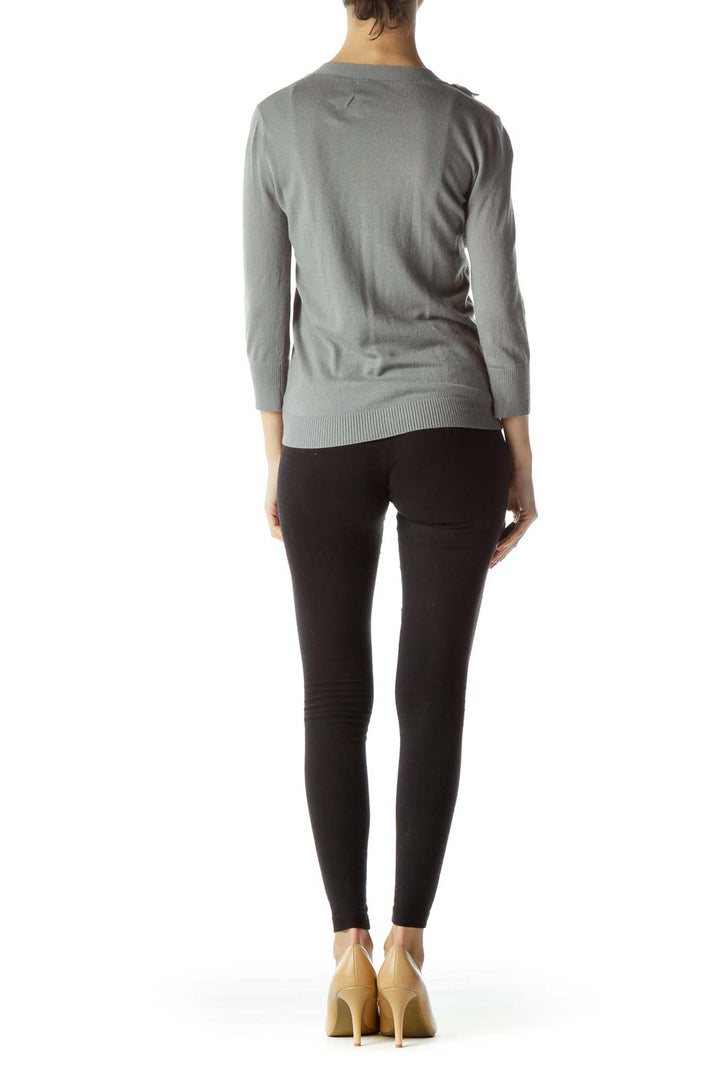 Back view of gray Club Monaco cardigan showing sleek design