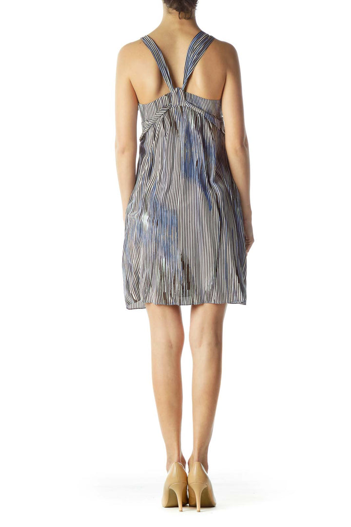 Back view of Banana Republic blue striped sleeveless dress showing racerback design