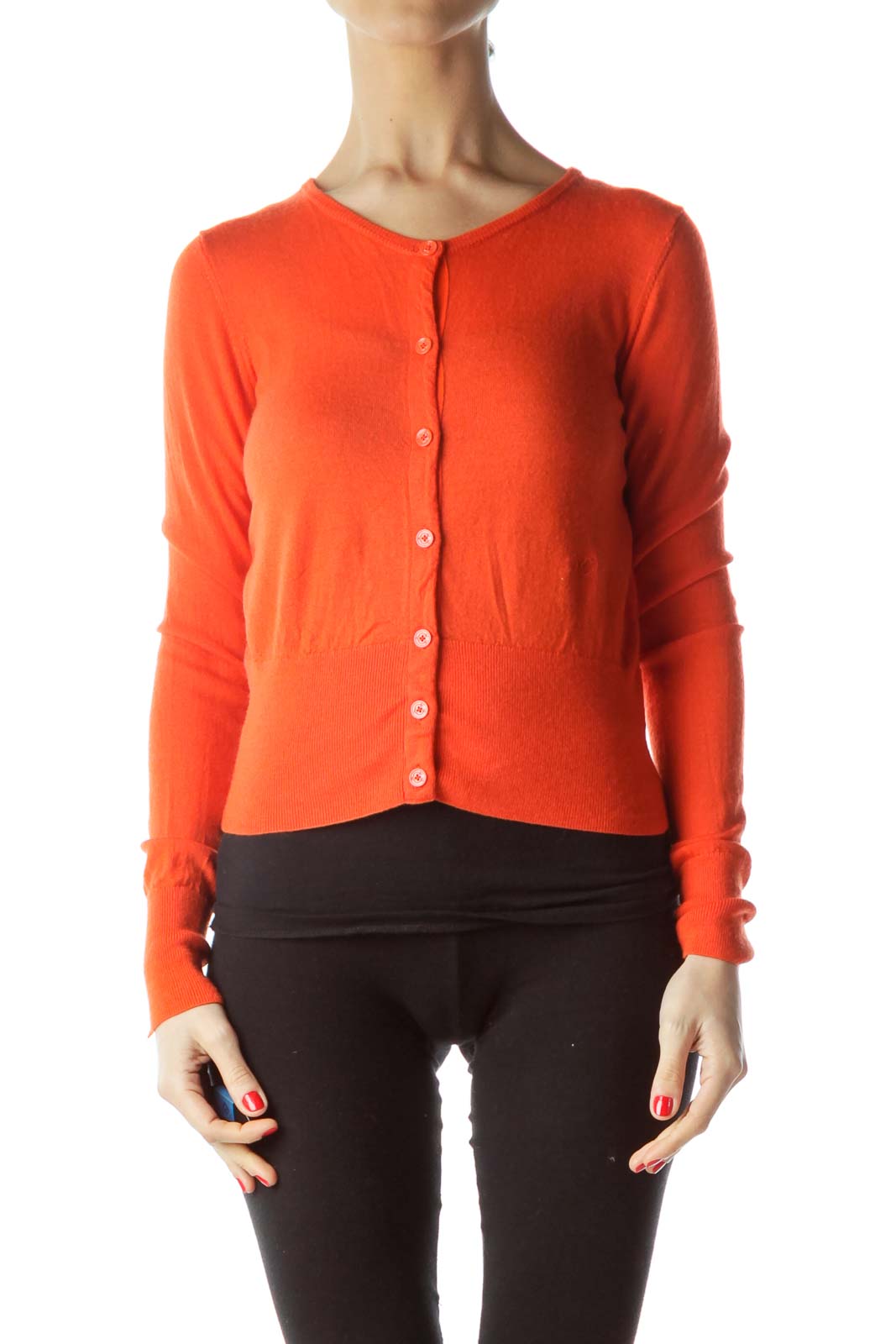 Front view of C. Wonder orange cropped button-up cardigan on model